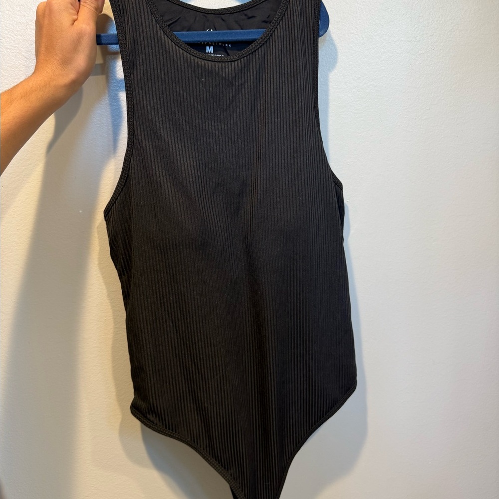 Klassy Network Black Ribbed Bodysuit